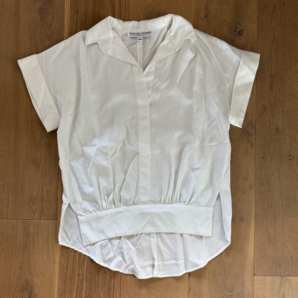 Inclán studio white collard silk tee